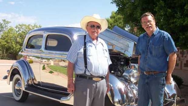 In this file photo, Leo Gephart (left), owner of Gephart Classics in Scottsdale, Ariz., and Lon Krueger (right) stand with the 1936 stainless-steel Ford they co-owned.