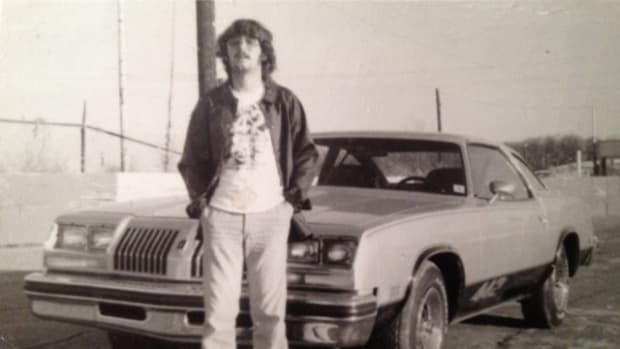 A sign of the times, owner Clifton Cummins posed in his bell bottoms with his 4-4-2 when it was nearly new. More than $2,000 in options — such as bucket seats, console, and Super Stock III wheels — brought the $3998.80 base price of his Cutlass S to $6093.90.