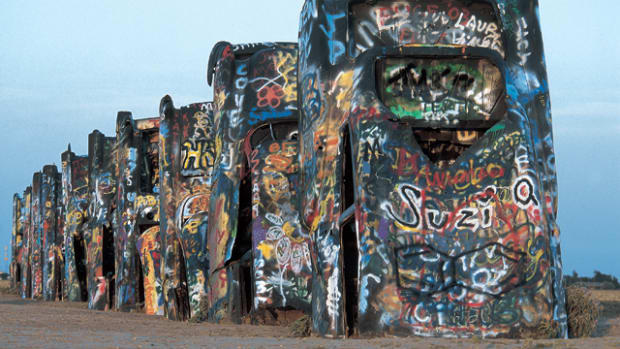 Thousands of graffiti artists have added their marks to the Cadillac Ranch cars, which were first planted in the Texas earth in 1974.