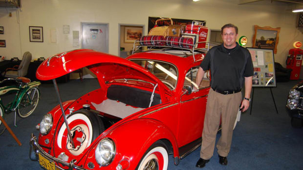 Rob Williams with his bright red VW at The Auto Collections in Vegas.