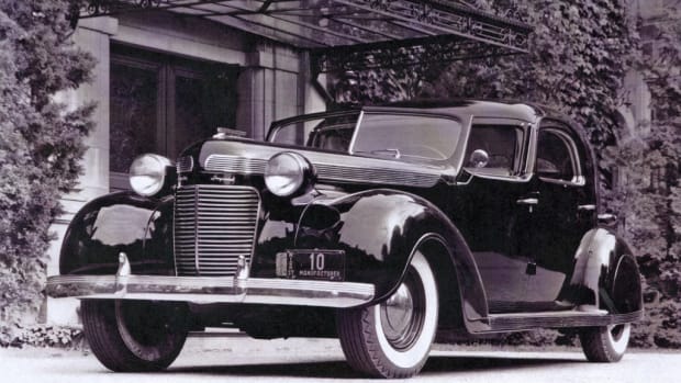 Period photos show the LeBaron-bodied 1937 Chrysler town car built for Mrs. Walter P. Chrysler. The car is a study in streamlining during the Art Deco era, with harmonizing speed lines throughout the entire design.