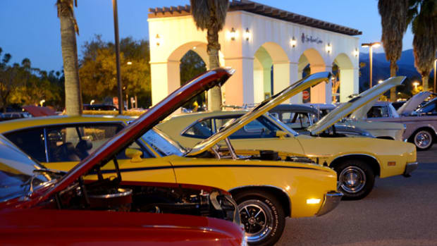 Cars with hoods open for inspection line up for McCormick’s Palm Springs Collector Car Auction. (Photo by Bill Marchese)