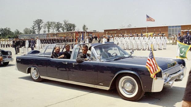 Secret Service agents accompanied JFK inside the SS-100-X, shown here with the protective bubble in place.