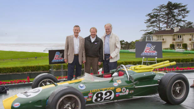  This 1965 Lotus-Ford 38, coming to us from The Henry Ford museum, was the first of the revolutionary rear-engine cars to win the Indianapolis 500. Here, the restored car makes its North American premier at the 2010 Pebble Beach Concours d'Elegance with Edsel B. Ford II (middle) and legendary drivers Bobby Unser and Dan Gurney beside it.