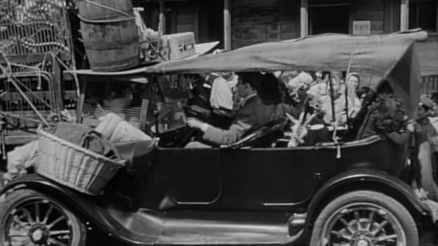 The 1919 Dodge Brothers touring and Jimmy Stewart's character, George Bailey, during happier moments in 'It's a Wonderful Life.'