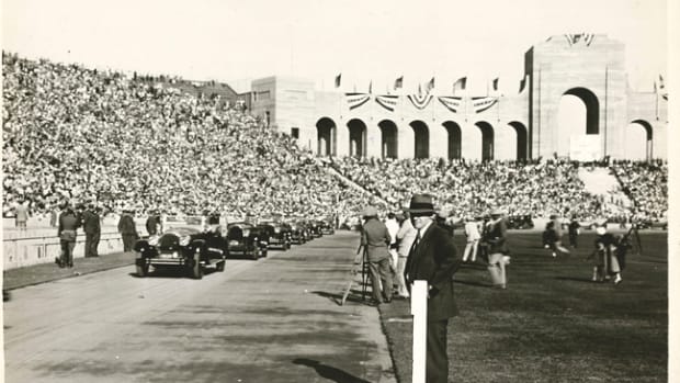  This original picture carries the hand-written caption, “Lindbergh’s Packardized parade of 42 cars circles track on arrival in Los Angeles Coliseum, Sept. 21, 1927.” The photo was sent by Earle C. Anthony to the Packard head office for national publication.