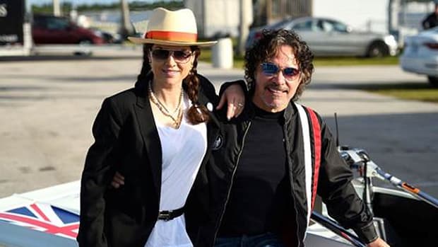  Rock-and-Roll Hall of Famer and car enthusiast John Oates and his wife, Aimee, posing with the 1984 Tiga SC84 Sports 2000 (Credit – John Singer 2020 Courtesy of RM Sotheby's)