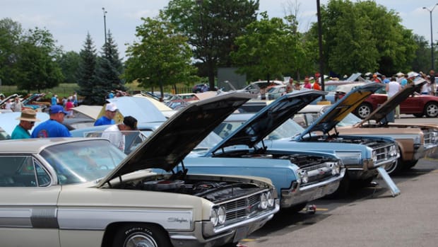 Most of the 480 cars at the Olds meet had their hoods raised.