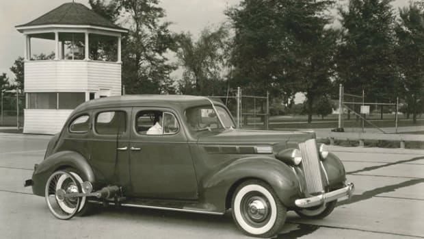 A 1938 Packard Six runs the Proving Grounds in tests. At times cars (selected at random off the assembly line) were literally destroyed in tests to uphold the quality goals of the venerated car maker.