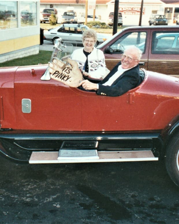 Pinky and Joyce in Chevy Superior Roadster at St. Ignace in 2001