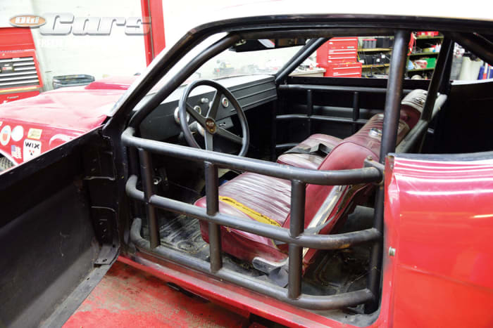 The 1969 Torino race car interior’s protective impact bars in the door openings. Note the inner side of each door was removed.