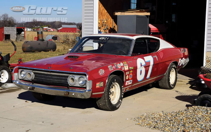 After 11 years at its most recent place of hiding, the 1969 Torino race car exits its owner’s garage.