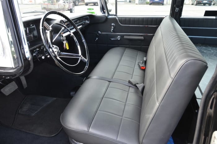 The original bench seat was reupholstered.