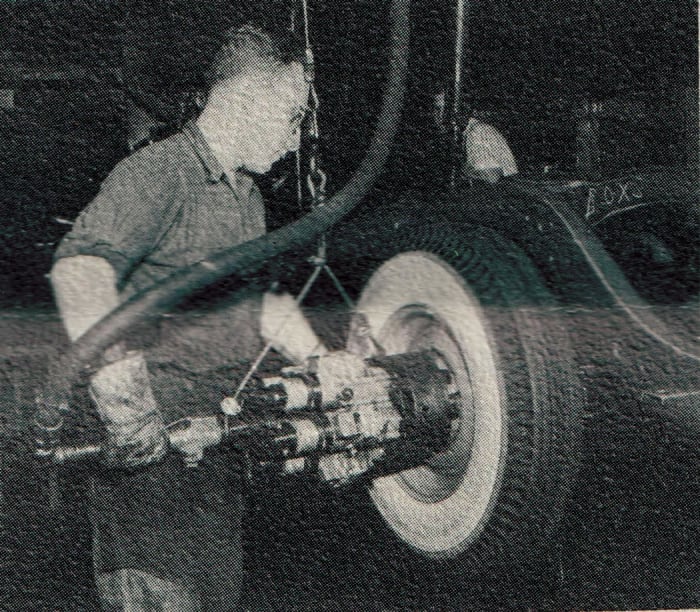 Wheels and tires were dropped from above to assembly workers, who installed the lug nuts five at a time with an automatic pneumatic wrench.