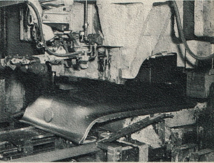 Two presses formed the “sweeping” “98” and “88” hoods in a single operation using 52 tons of force. More than 100 hoods could be stamped in one hour.