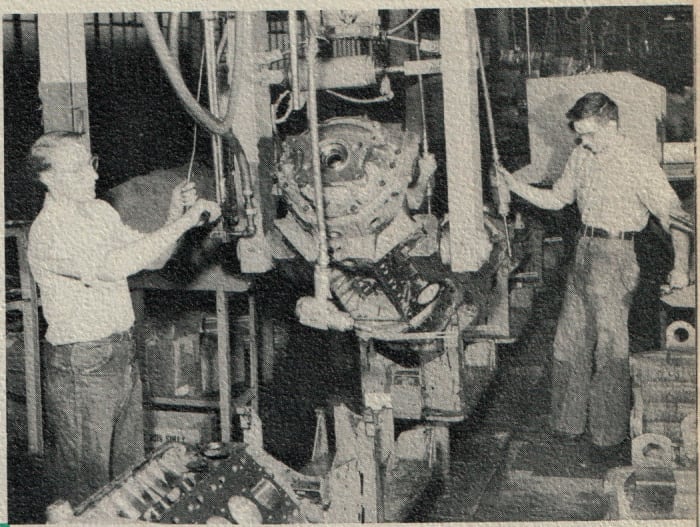 Engines were assembled on 119 pedestals along a 476-foot-long conveyor, beginning with the engine upside down.