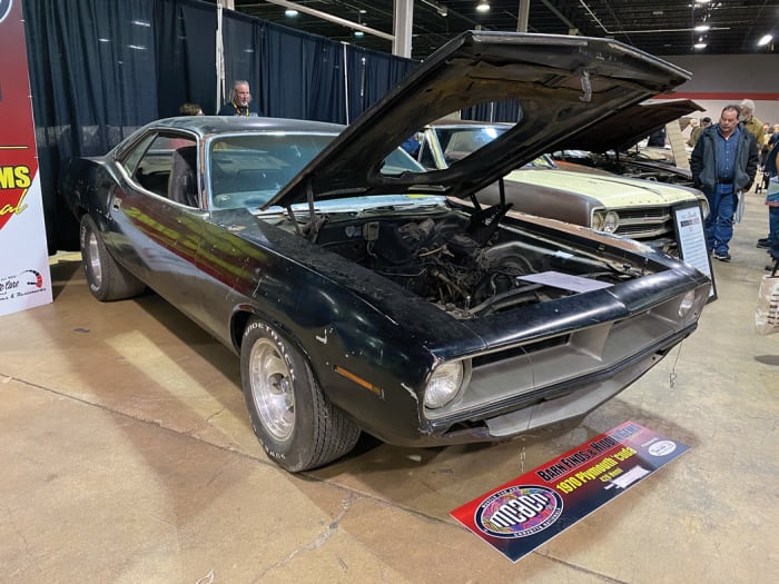 It’s hard to believe without seeing that there’s a real-deal, triple-black, four-speed 1970 Hemi ’Cuda that hasn’t yet been restored. This Hemi ’Cuda was purchased in early 2022 from the Arkansas owner who bought it back in 1978. The car was originally loaded with the optional A21 Elastomeric front bumper, N96 Shaker hood scoop, A34 Super Track Pak, A62 Rallye gauges, B51 power brakes, C16 center console, C62 six-way adjustable driver’s seat, G36 painted racing mirrors, N85 tach and an AM/8-track radio! It’s currently owned by Tom Rosemann.