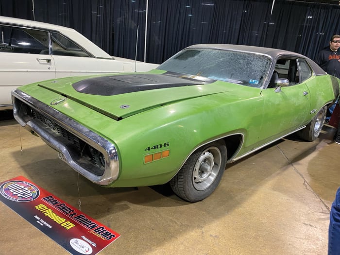Although parked in the “Barn Finds & Hidden Gems” display, Troy Bergeron’s 1971 Plymouth GTX packing 440 Six Pack power looked like it just needed a wash and wax before rumbling into the next cars and coffee. The “Gittix” had the optional Air Grabber hood and Sassy-Grass Green paint with a black stripe and interior.