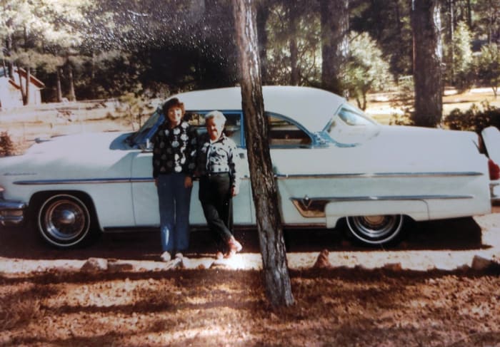 Original owner Sara Allison (believed to be at right) with the Lincoln after she had it repainted baby blue and the continental kit installed. Note the car is fitted with wire wheels, which are not known to be original (the wheels are obscured in the lone surviving 1954 photo).