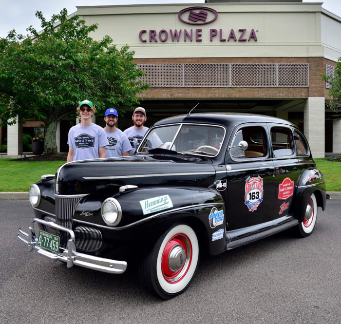 Great Race X-Cup Team - Jack Pontius, John Taller and Gavin Swift with the 1941 Ford Sedan at the Crown Plaza Hotel in Warwick, Rhode Island.