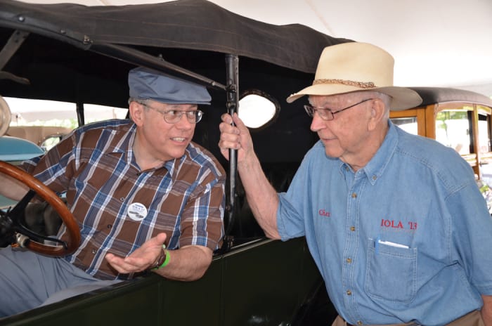 The late Chet Krause (right), who originated the Iola Car Show, chats with Old Cars columnist Gerald Perschbacher at the 2013 edition.