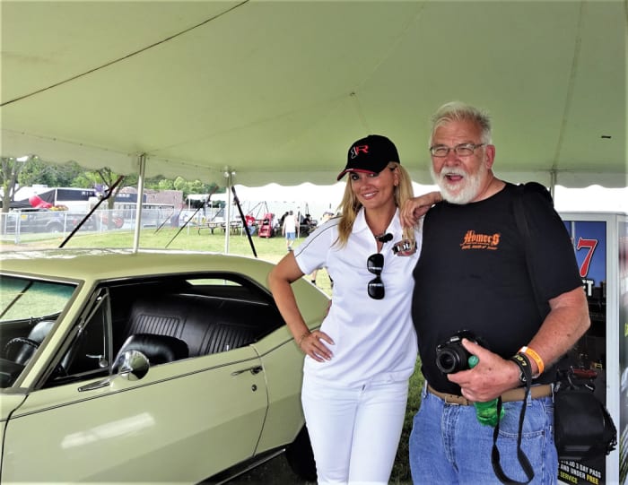 The author with automotive TV celebrity Courtney Hansen at the 2016 Iola Car Show. Sending a car show rep to the SEMA Show really started the celebrity visits  to the show.