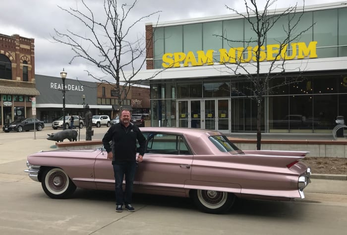 Once our tour of the Spam Museum concluded, Rick and I split ways; my dad picked me up and took me back to my car in St. Paul, and Rick (pictured) drove Rosemary Margaret to her new home in Eau Claire, Wis. On this last leg of Rick’s drive home, the rain turned to sleet, but she held steady the course on her bias-plies. Rick has since additionally christened her a keeper, and he looks forward to adding many more miles to the ’61 Fleetwood’s odometer.