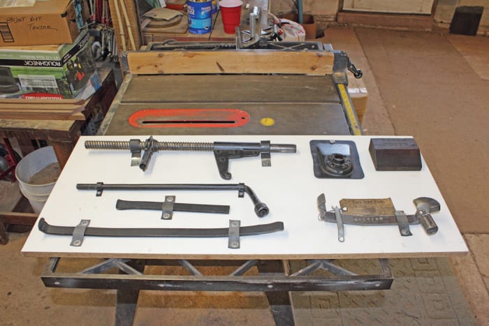 Tools that originally came with the Plymouth; pictured at bottom right is the device to remove a tire from a Plymouth safety rim.