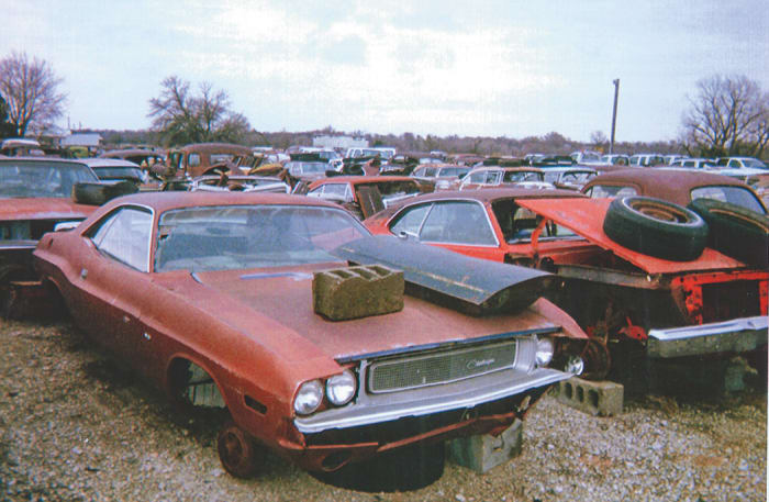 A desirable 1970 Dodge Challenger has been picked of some components, but retains many additional donor-quality parts.