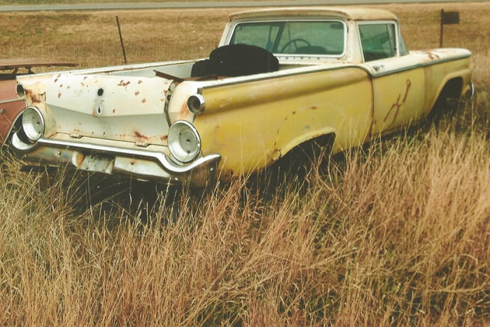 This 1959 Ford Custom Ranchero pickup has suffered rust-through around its lower rear body panels, but retains donor-quality unique parts, such as its doors, tailgate and rear window.