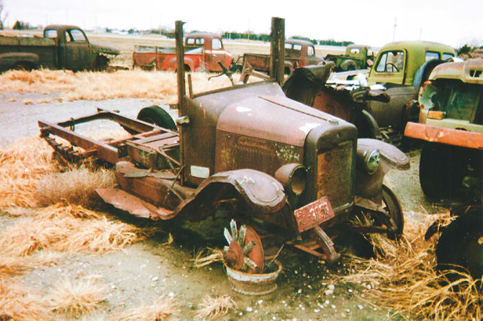 One of several old-timers in the yard is what’s left of this wood-spoke, late-1920s International truck.