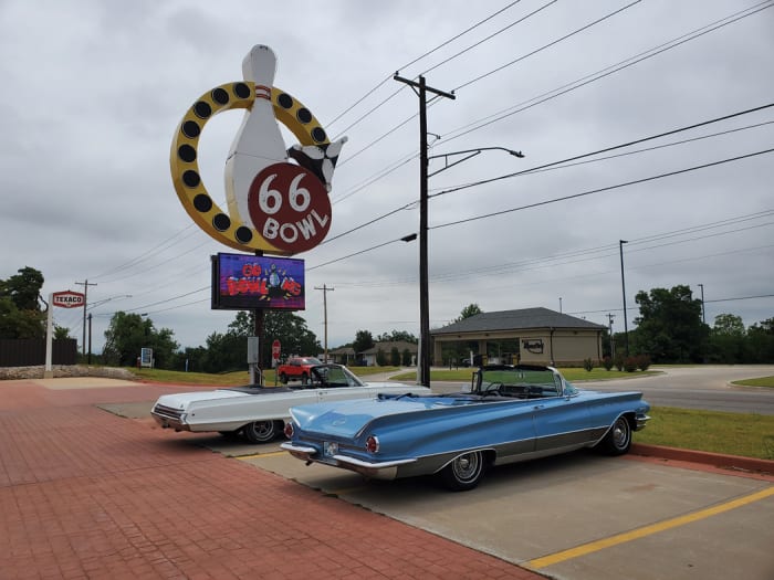The road trip included many stops along Route 66 at sites with vintage signs, often glowing with neon. The “Chrysler/Plymouth” sign (above right), is located near Route 66 in Bristow, Okla.