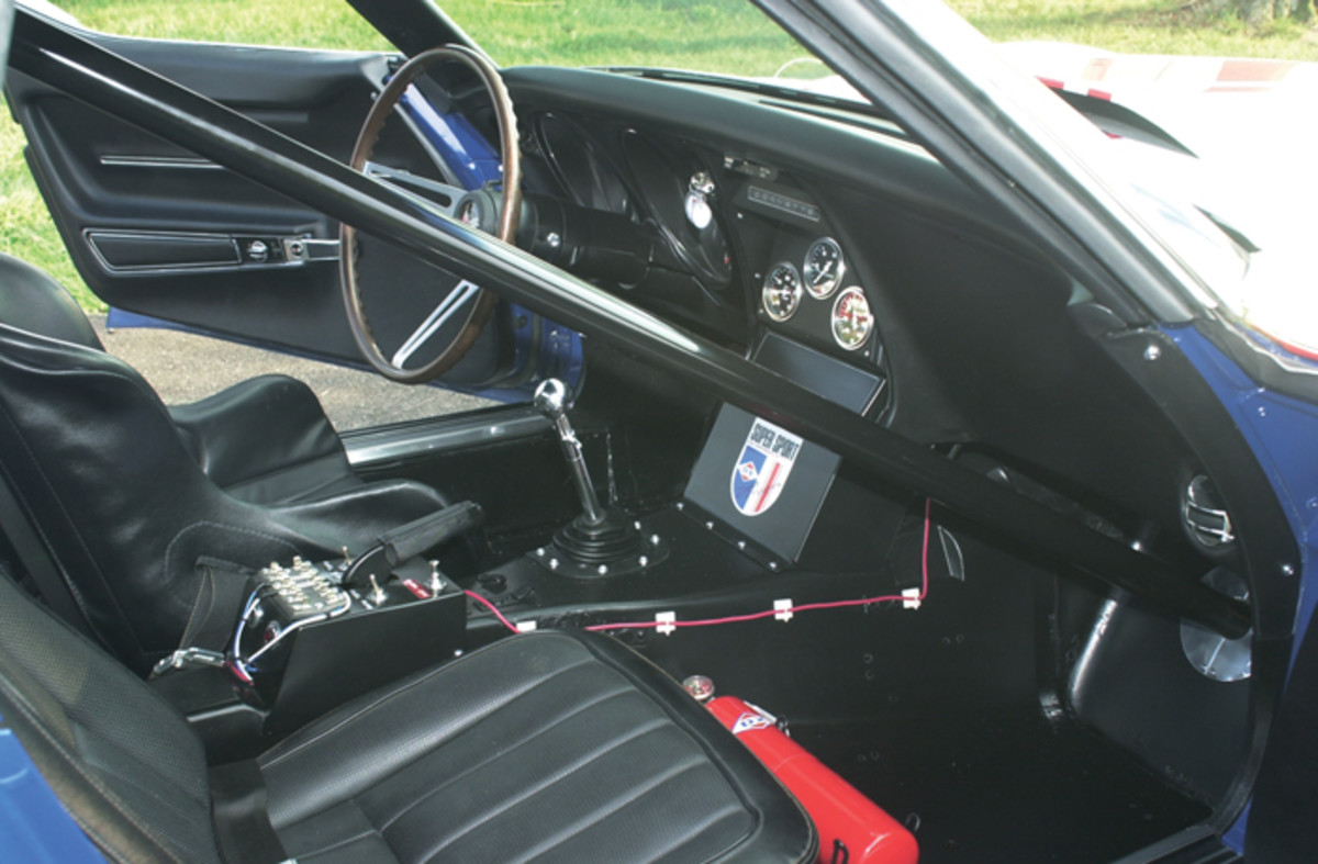 The stripped-down-for-racing interior has no trim items or floor carpeting.