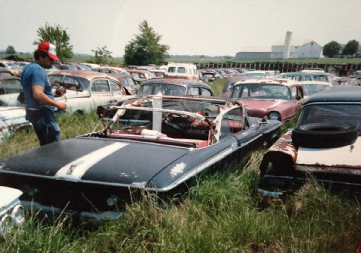 A 1961 Plymouth Fury convertible is highly desirable today, but when this example was photographed in the late 1980s, it was an undesirable ugly duckling. With luck, someone with foresight saved this Fury before the yard was cleared out in the 1990s.