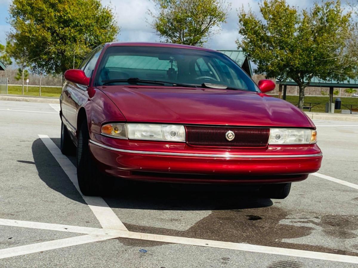 The front view styling of the LHS is definitely from the ‘90s. The LHS has elliptical cues but did not take on the “used bar of soap” aesthetic that plagued many cars from the 1990s.
