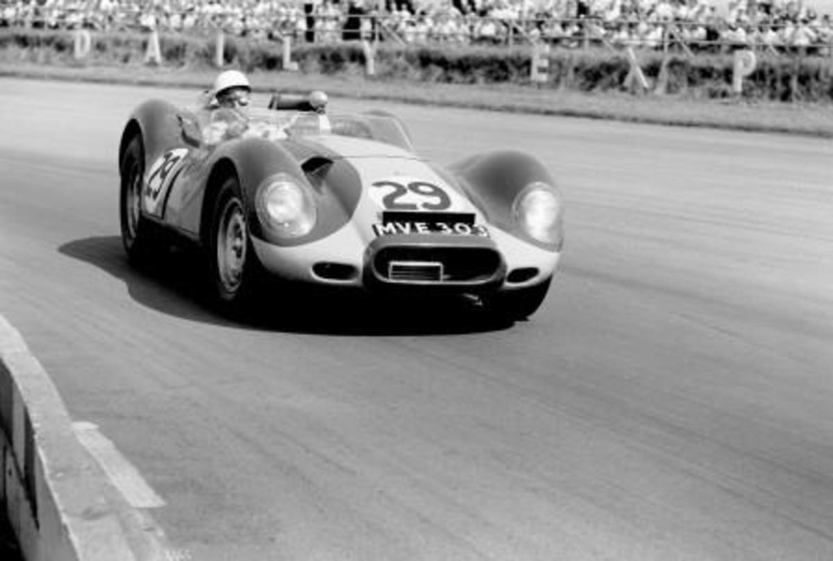 Stirling Moss winning at Silverstone in 1958 driving a Lister-Jaguar. (Courtesy of LAT Archive)