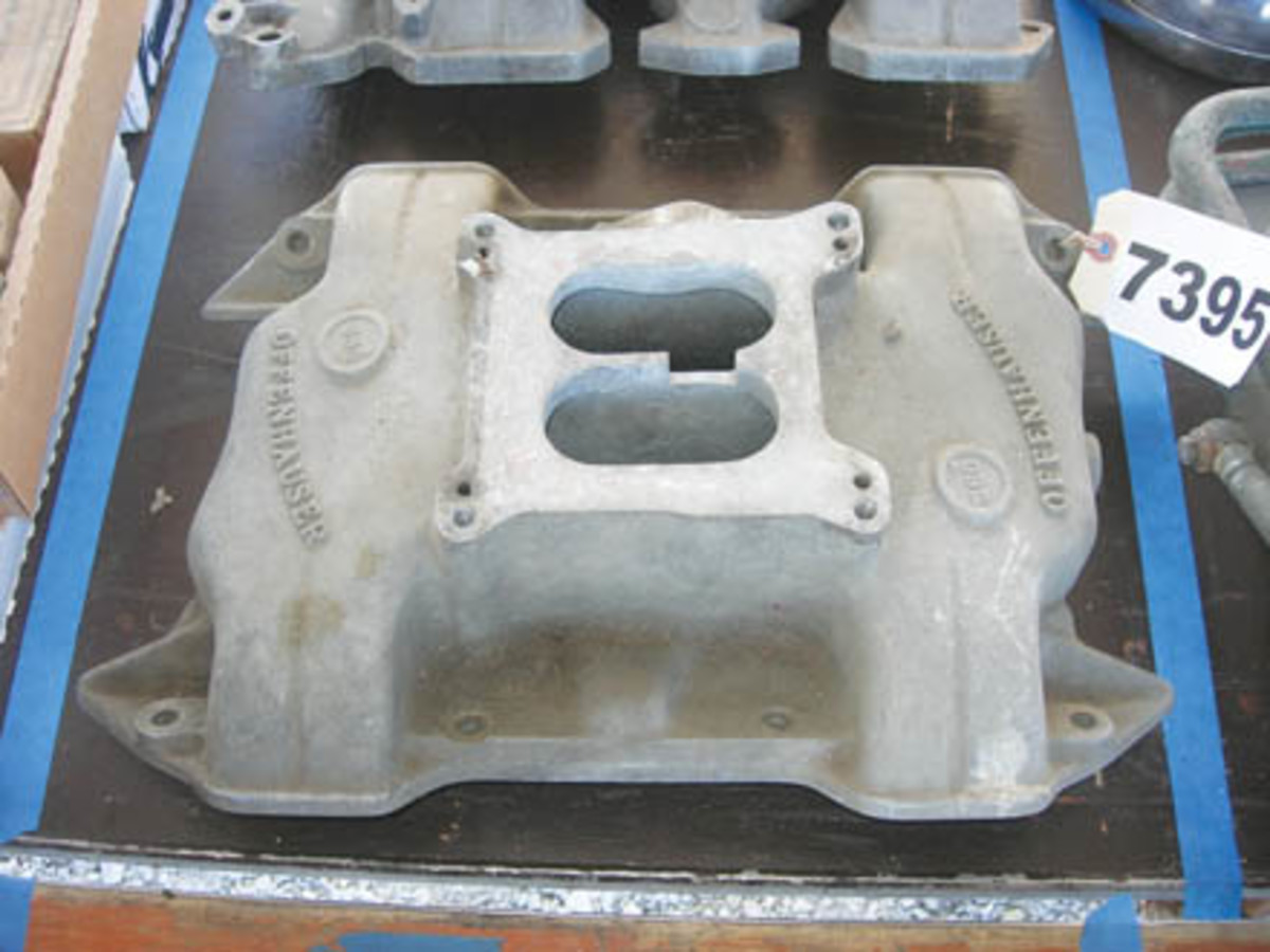 This Offenhauser four-barrel aluminum intake manifold was one-half of a lot that also contained what was believed to be a three-carb Oldsmobile manifold, year unknown. The pair sold for $700.