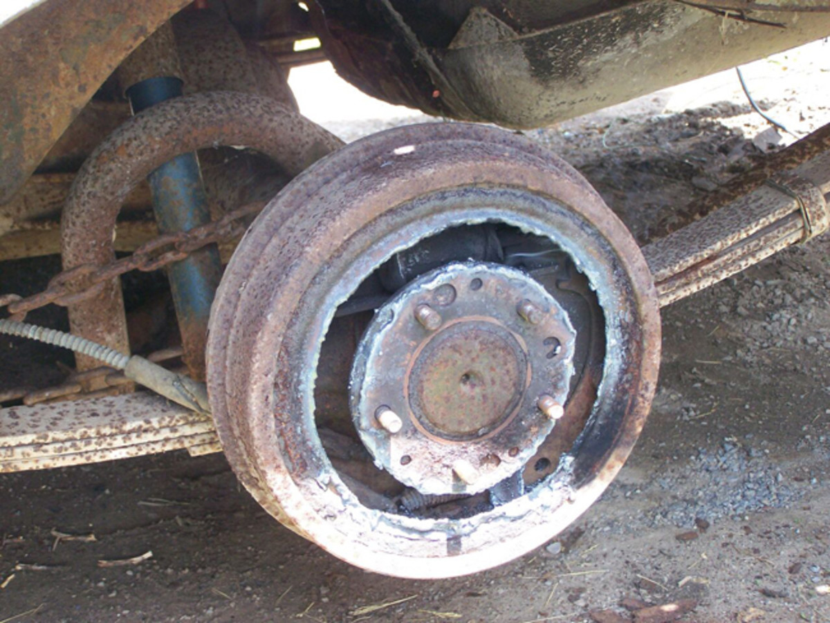 Both ’57 hardtops suffered from locked brake drums that prevented the cars from rolling. Cutting the drums with a torch allowed the cars to be rolled.