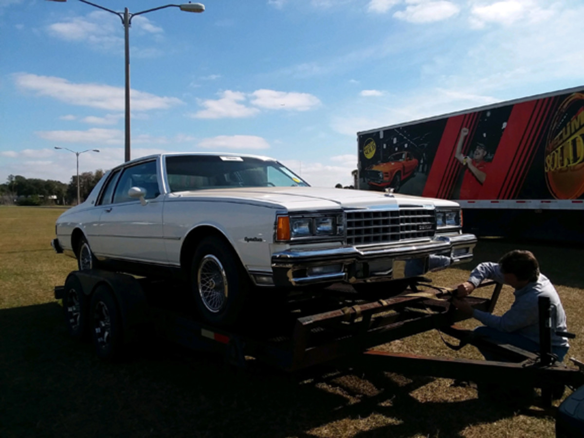  Tom Truhlar loading the Caprice coupe after the sale.