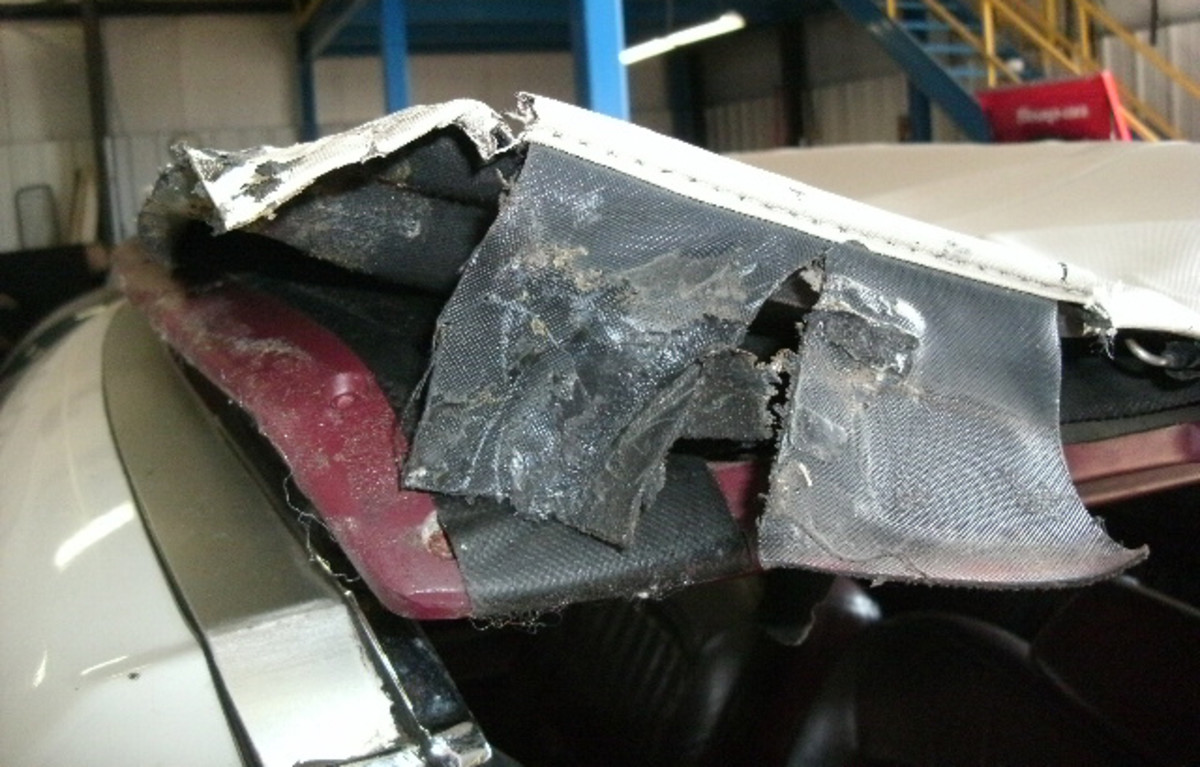 The top and side flap were removed from the convertible top frame.