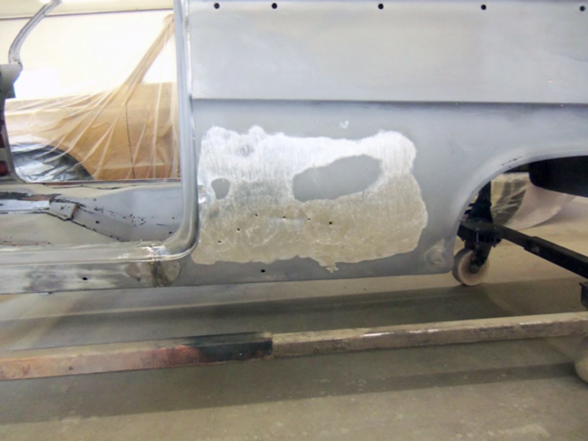 This area did have Bondo. It had many holes drilled into it. That was very common years ago – people would drill holes in the body to repair a dent, and the Bondo would ooze in there and hold on, but that is not done in a professional shop anymore.
