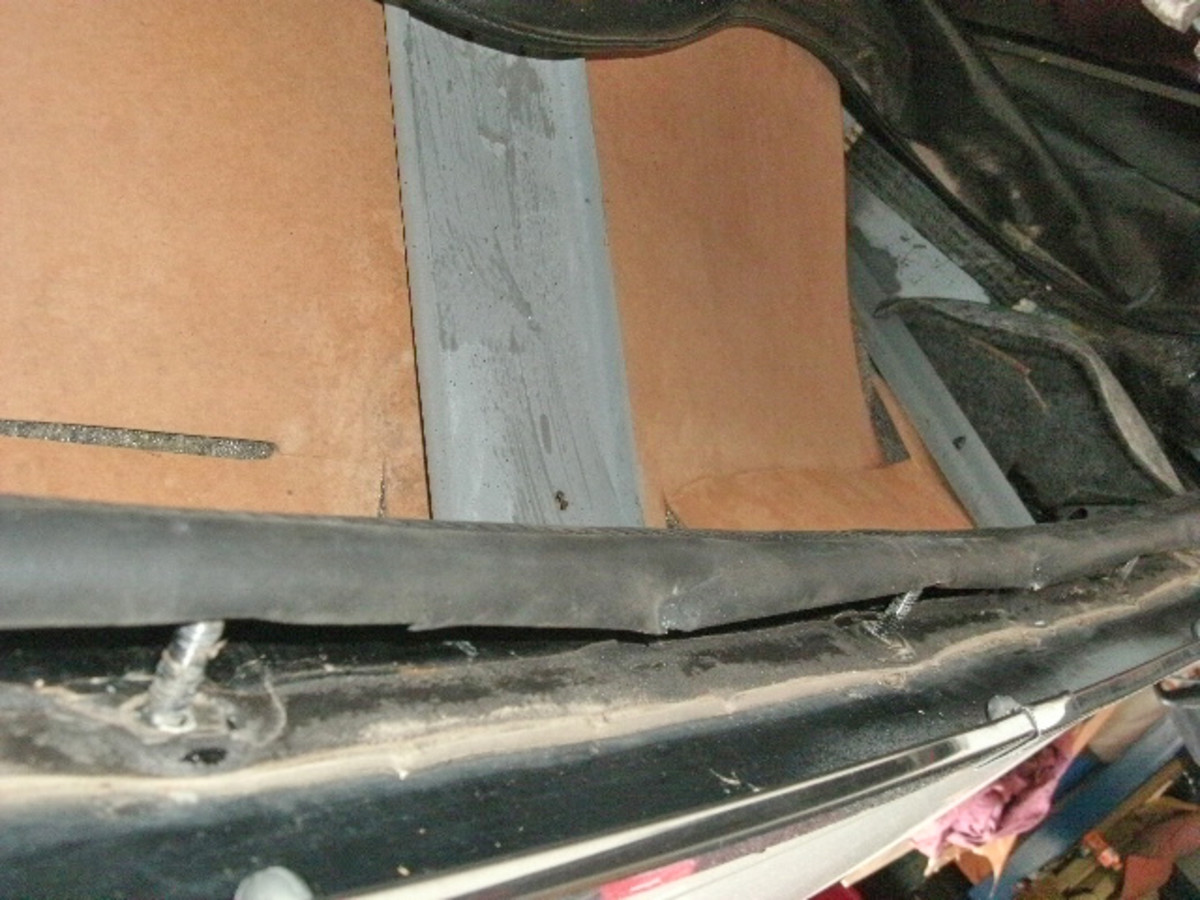 The bottom of the rear curtain, which holds the back glass, was photographed so it could be reassembled correctly.