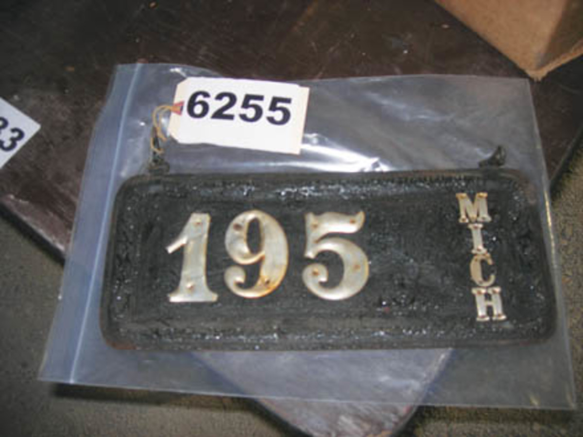 Pre-dating metal license plates, this early Michigan plate made from leather sold for $2,000.