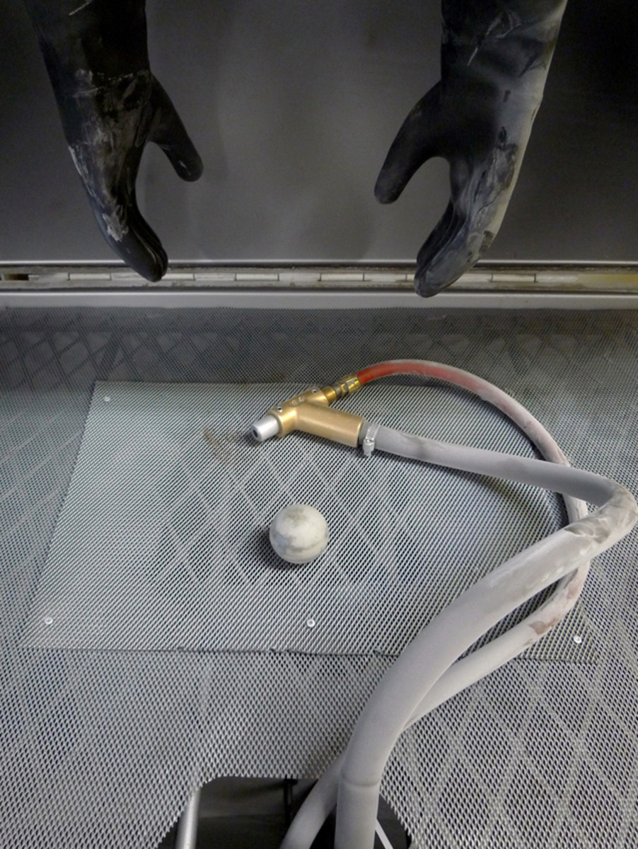 Let’s just see if the ol’ bead blasting cabinet won’t help us accelerate the aging process. Knowing that the old knob’s material may be softer, or harder than J-B Weld, and the two materials might blast away at different rates of speed, we’ll take this step gingerly. 