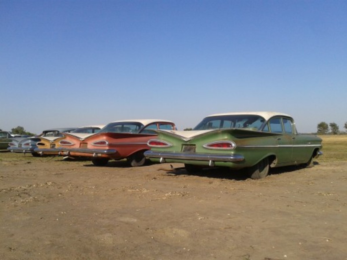 A line of unsold 1959 Chevrolet four-doors and one lone two-door Bel Air traded in to Ray Lambrecht of Lambrecht Chevrolet Co. The 1959 Bel Air two-door sedan is already being flipped by a Nebraska car dealer.