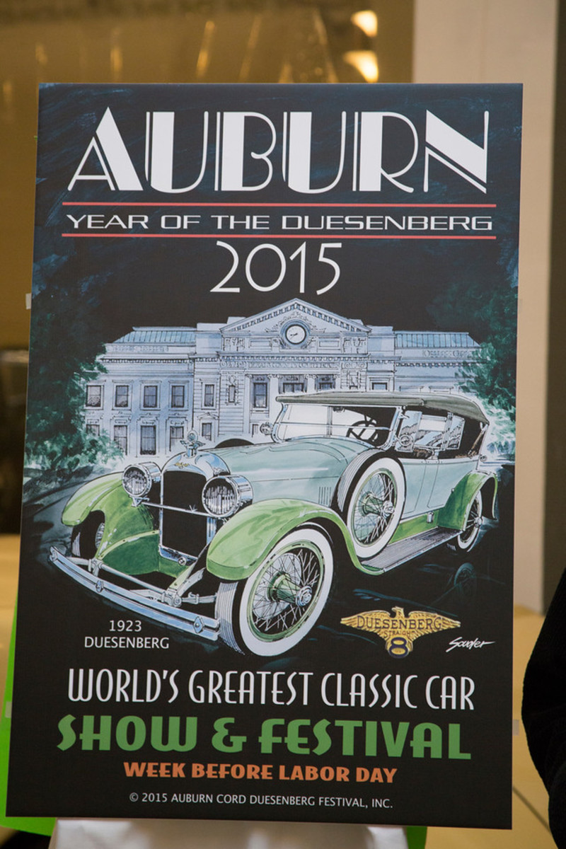  Kicking off 2015 and the “Year of the Duesenberg” was done in great style as Auburn resident, John Souder, unveiled this year’s poster artwork. The 2015 poster features a green hued 1923 Duesenberg on loan to the Auburn Cord Duesenberg Automobile Museum perched perfectly in front of the DeKalb County Courthouse.