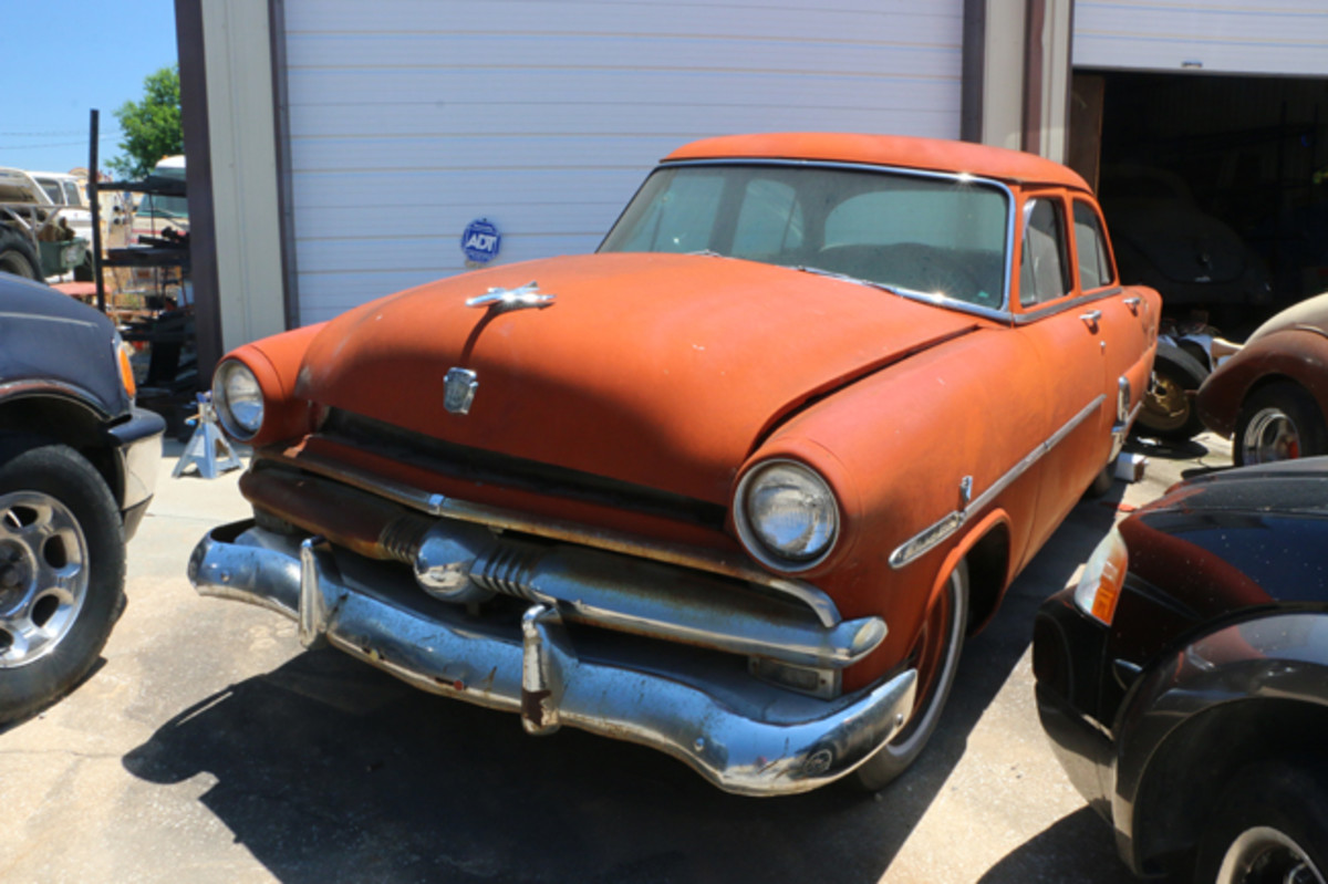  You never know what might be under the hood of an old car. This ‘53 Ford Crestline sedan has a flathead V-8 with dual carbs and intake manifold. It is for sale as a complete unit.