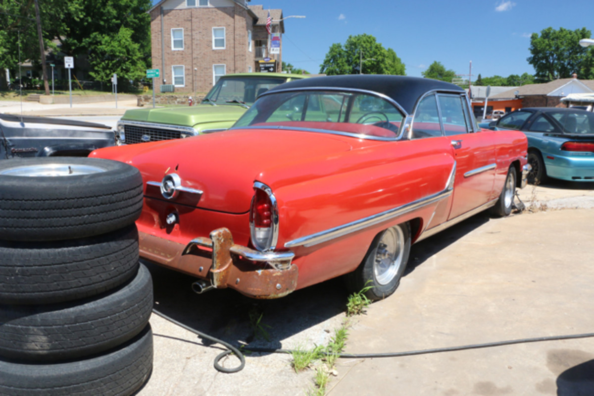  This red-and-black 1955 Mercury is an automatic and runs and drives. It has a great red and black interior. The bumpers are very rusty, and need to be re-chromed or replaced.