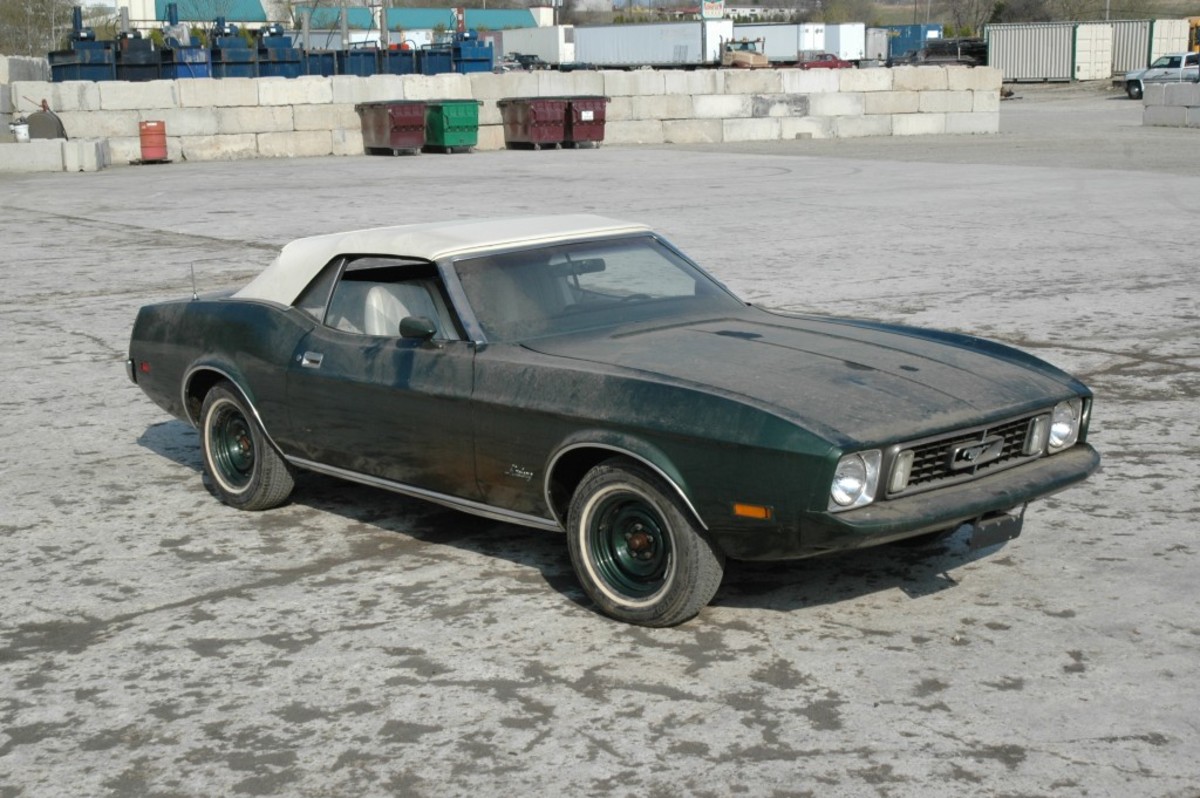 The 1973 Mustang with 40-some years of dust.