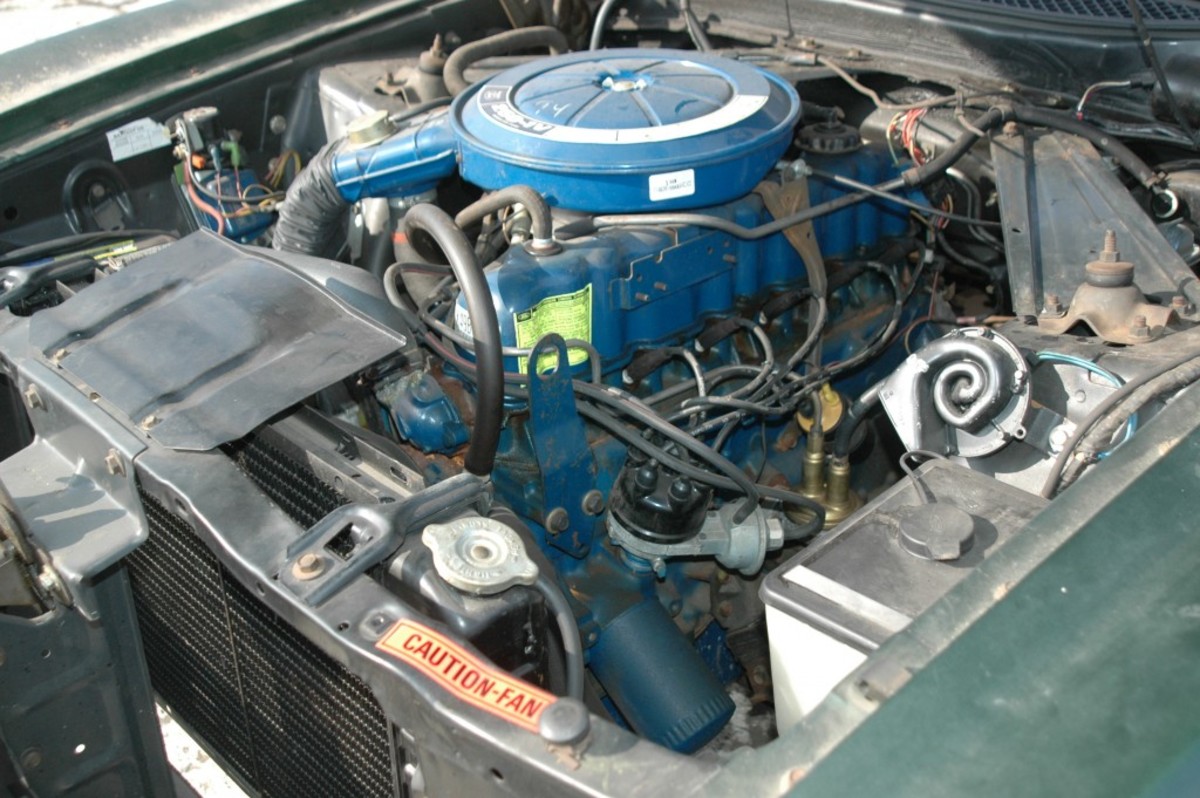 Note the location of stickers around the engine compartment and the overspray patterns, including the spray on the oil filter. When the engine was painted Ford blue, the oil filter was clearly installed already.